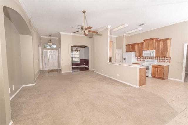 unfurnished living room with light tile patterned floors, ceiling fan with notable chandelier, and crown molding