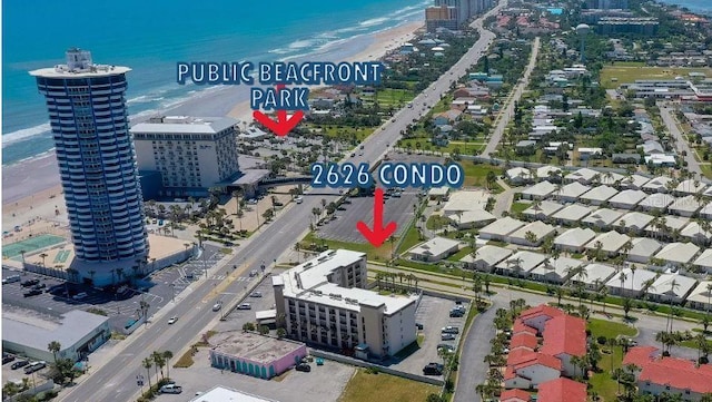 aerial view with a view of city, a water view, and a view of the beach