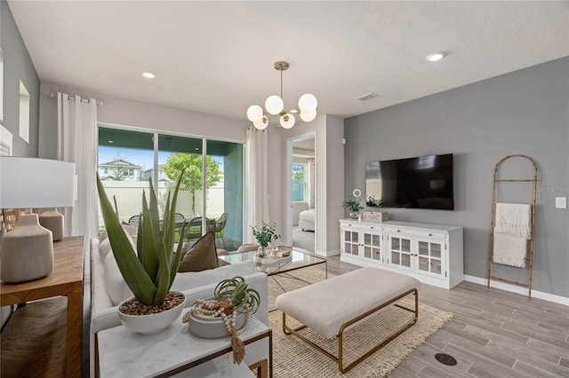 living room with a chandelier