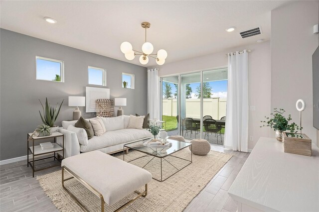 living room with a notable chandelier