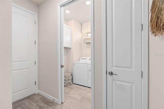 laundry room featuring separate washer and dryer