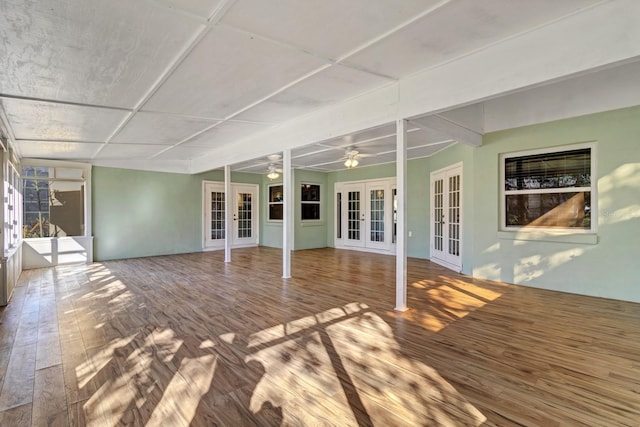 wooden terrace with french doors and ceiling fan