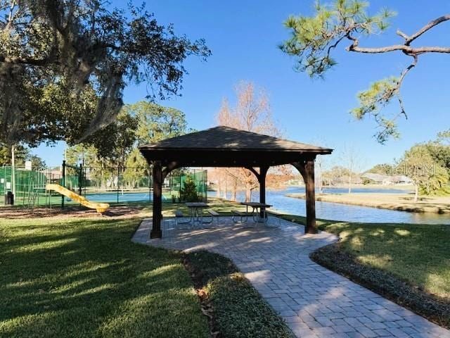 view of property's community with a gazebo and a yard