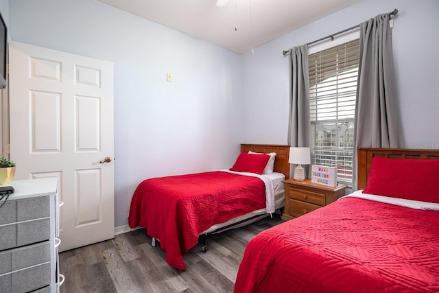 bedroom featuring ceiling fan and hardwood / wood-style flooring