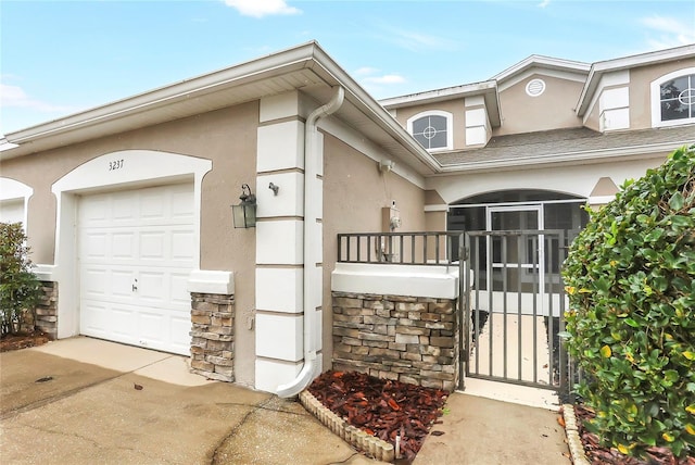 view of side of home featuring a garage