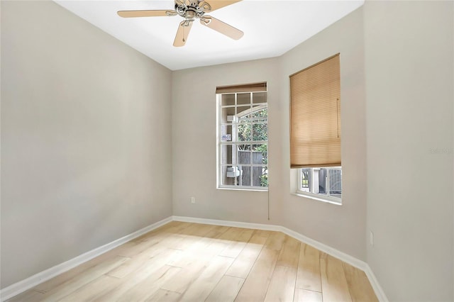 unfurnished room featuring light hardwood / wood-style floors and ceiling fan