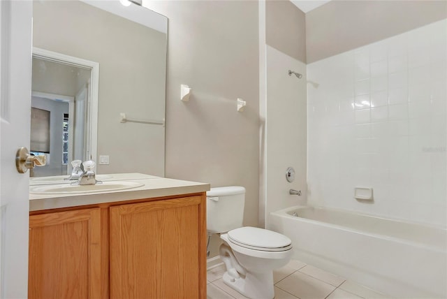 full bathroom with vanity, toilet, tiled shower / bath combo, and tile patterned flooring