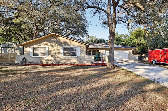 single story home featuring a garage