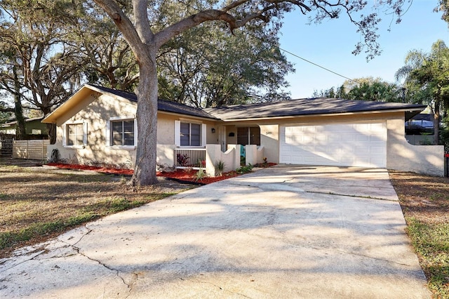 ranch-style home with a garage