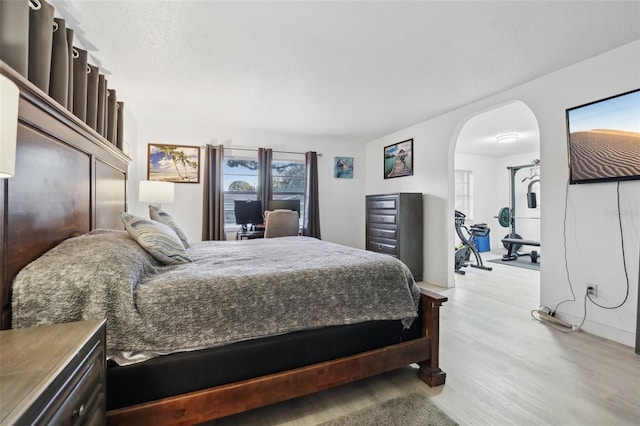 bedroom featuring light wood-type flooring