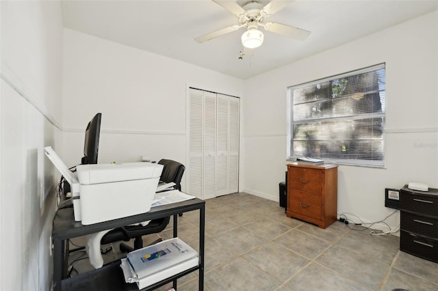 office space with ceiling fan and light tile patterned flooring