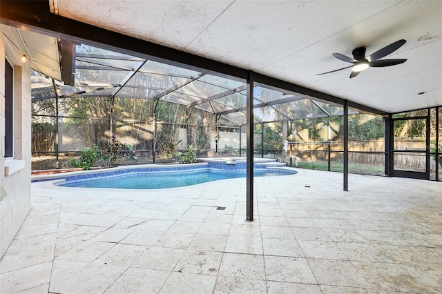 view of pool featuring ceiling fan, a patio area, and a lanai