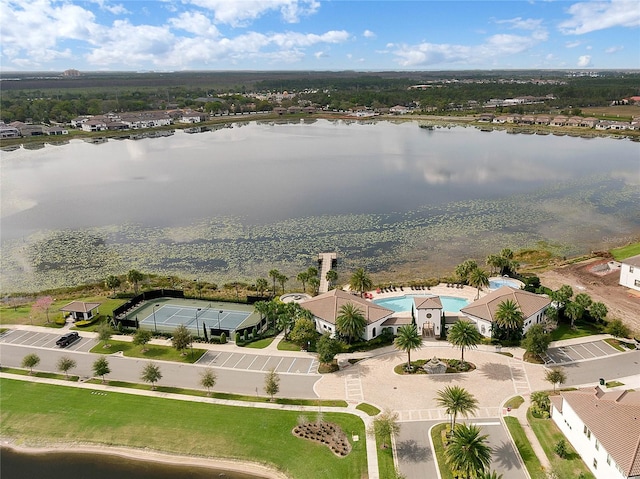 drone / aerial view with a water view