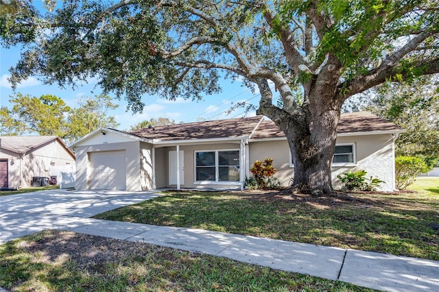 single story home featuring a garage