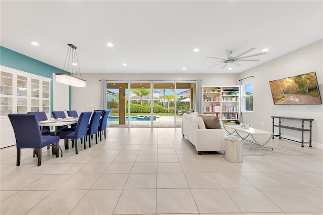 tiled living room featuring ceiling fan