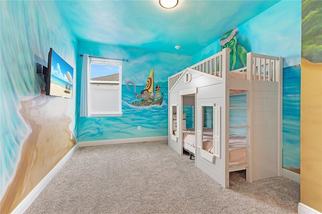 unfurnished bedroom with a textured ceiling and carpet flooring