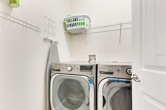 laundry area featuring separate washer and dryer