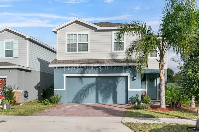 view of front of property featuring a garage