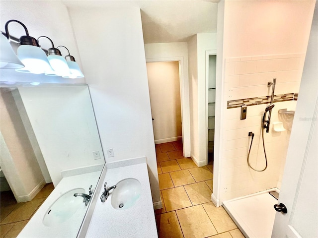 3333 Wauseon Dr, Saint Cloud, FL 34772 - bathroom with tiled shower, vanity, and tile patterned floors