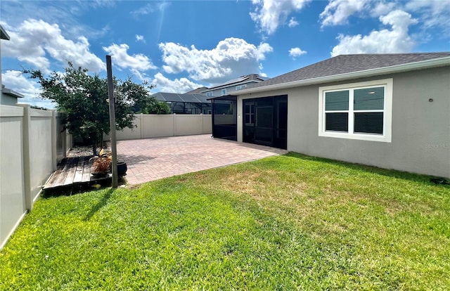 3333 Wauseon Dr, Saint Cloud, FL 34772 - view of yard featuring a sunroom and a patio area