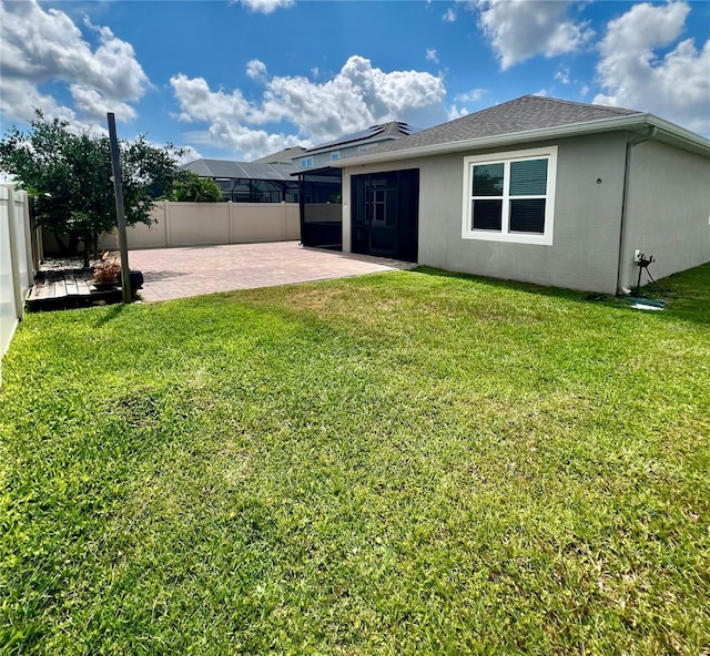 3333 Wauseon Dr, Saint Cloud, FL 34772 - back of house featuring a patio area, stucco siding, and a sunroom