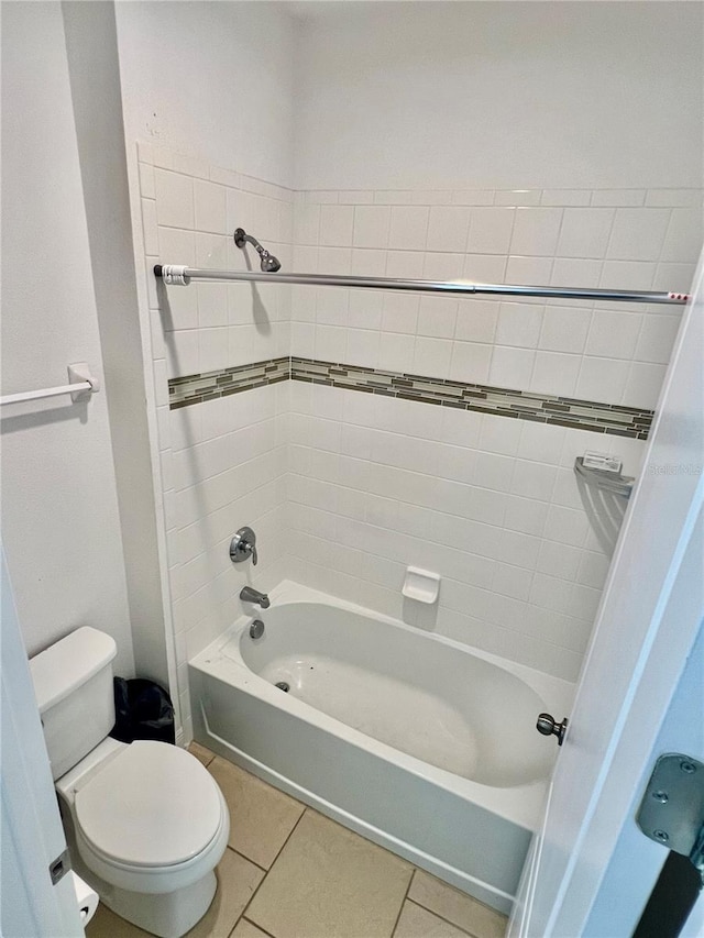 3333 Wauseon Dr, Saint Cloud, FL 34772 - bathroom featuring toilet, tile patterned flooring, and shower / bathtub combination