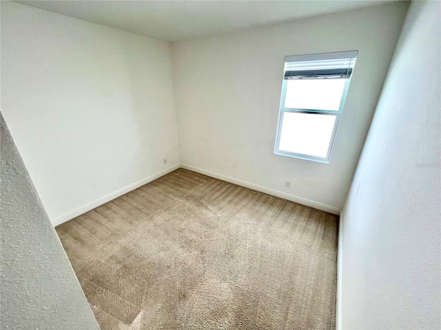 3333 Wauseon Dr, Saint Cloud, FL 34772 - unfurnished room featuring carpet and baseboards