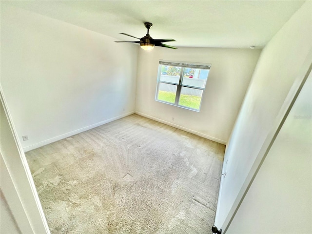 3333 Wauseon Dr, Saint Cloud, FL 34772 - empty room featuring baseboards, carpet, and a ceiling fan