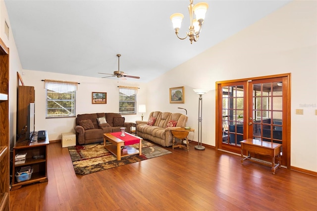 living room featuring french doors, high vaulted ceiling, dark wood-type flooring, and ceiling fan with notable chandelier