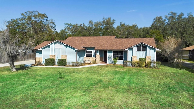 ranch-style house with a front yard