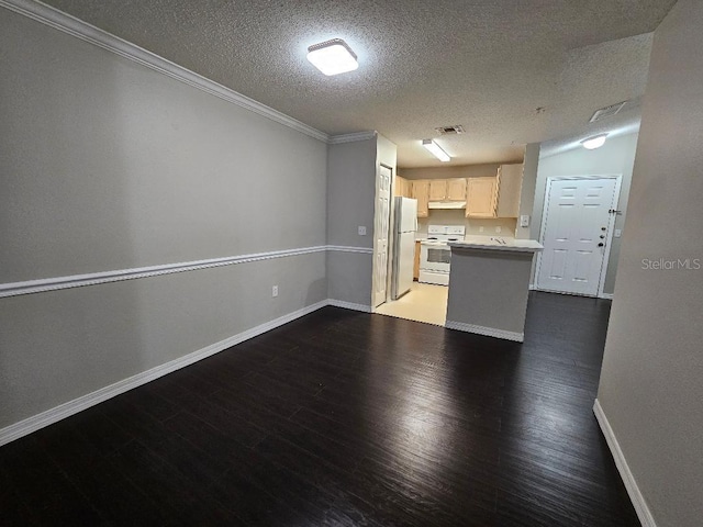 kitchen featuring white cabinets, a textured ceiling, white appliances, and dark hardwood / wood-style floors