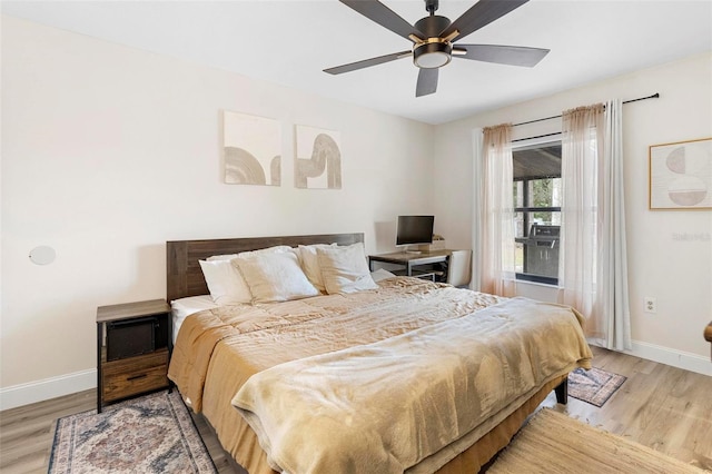 bedroom featuring ceiling fan and light hardwood / wood-style floors