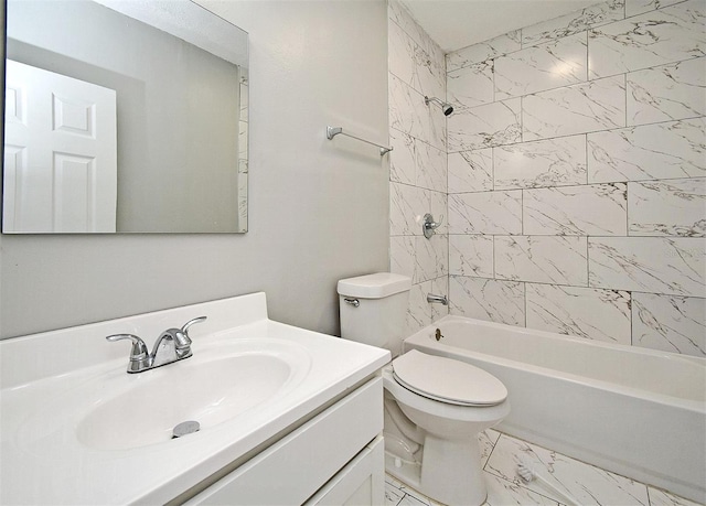 full bathroom with vanity, toilet, and tiled shower / bath