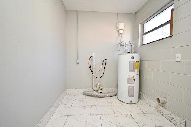 utility room with electric water heater