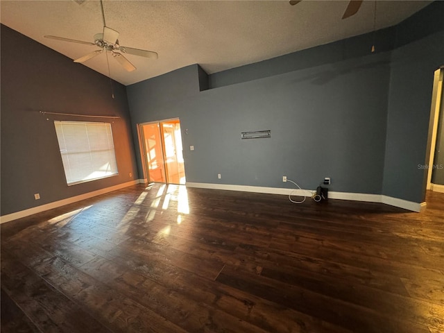 unfurnished room featuring high vaulted ceiling, ceiling fan, and dark wood-type flooring