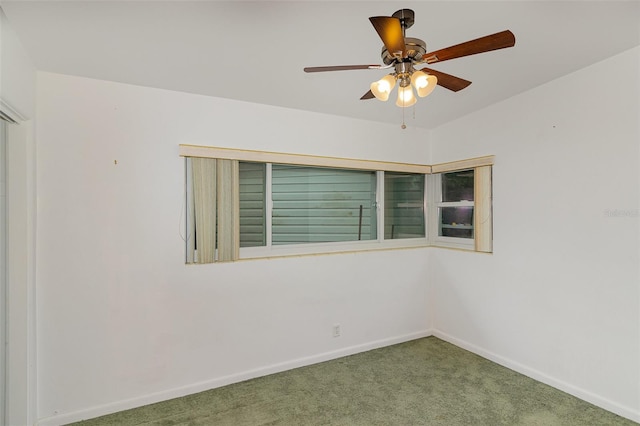 carpeted empty room with ceiling fan