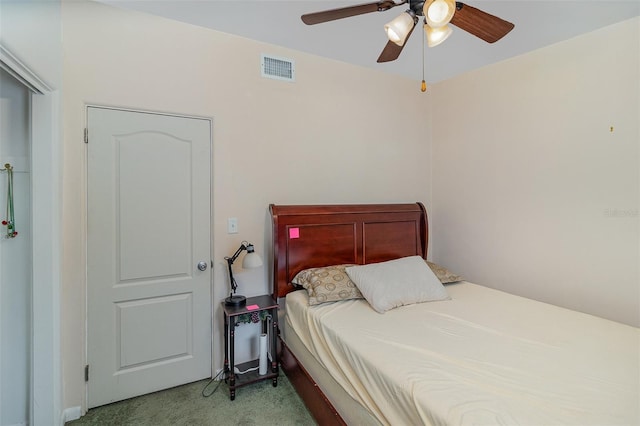 bedroom with light carpet and ceiling fan