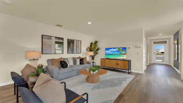 living room with hardwood / wood-style flooring