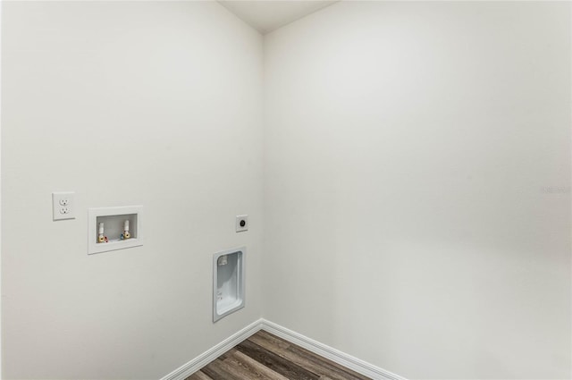 laundry room with hookup for a washing machine, laundry area, dark wood-type flooring, baseboards, and electric dryer hookup