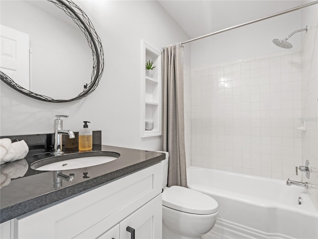 full bathroom featuring vanity, shower / bath combination with curtain, and toilet