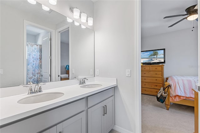 bathroom with vanity and ceiling fan