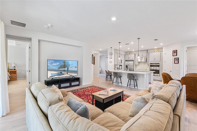 living room featuring light hardwood / wood-style floors