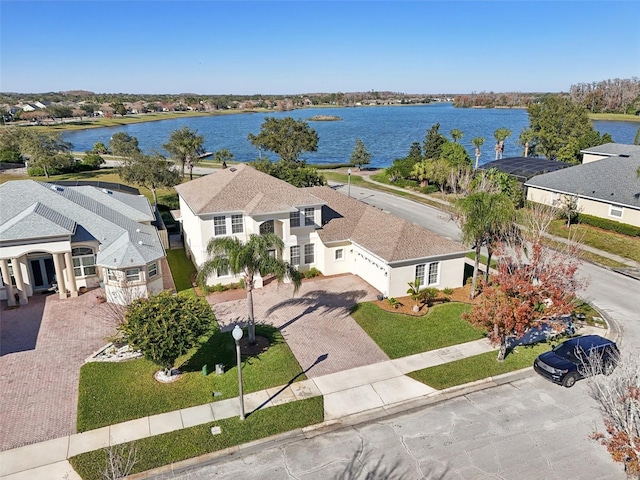 drone / aerial view with a water view