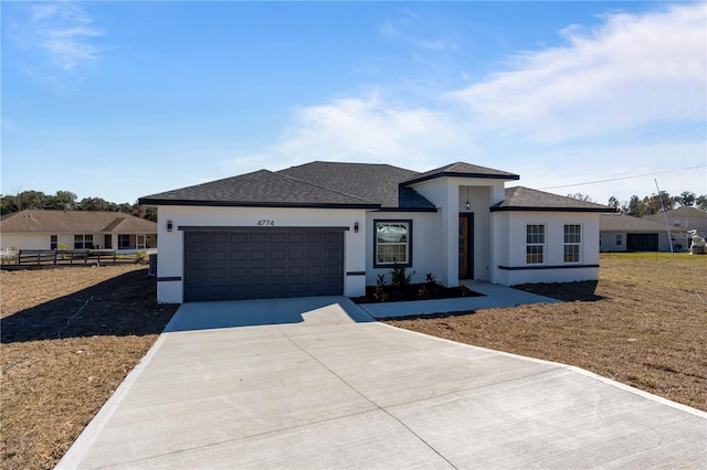 prairie-style home with a garage