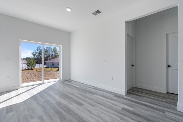 empty room featuring light hardwood / wood-style floors