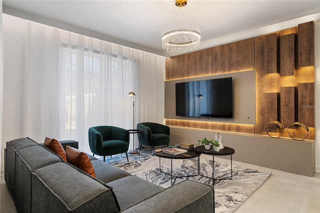 living room featuring a healthy amount of sunlight and an inviting chandelier