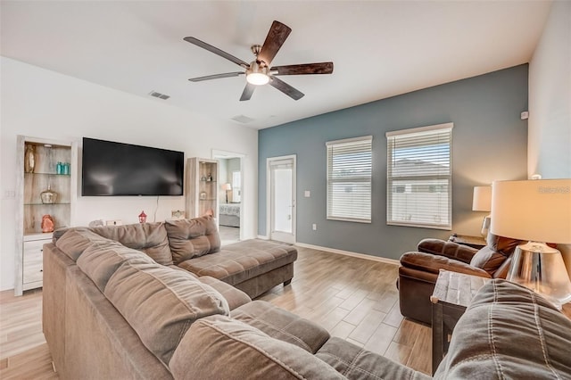 living room with ceiling fan