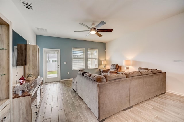 living room with ceiling fan