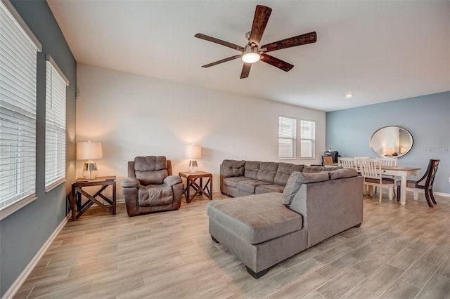 living room with ceiling fan