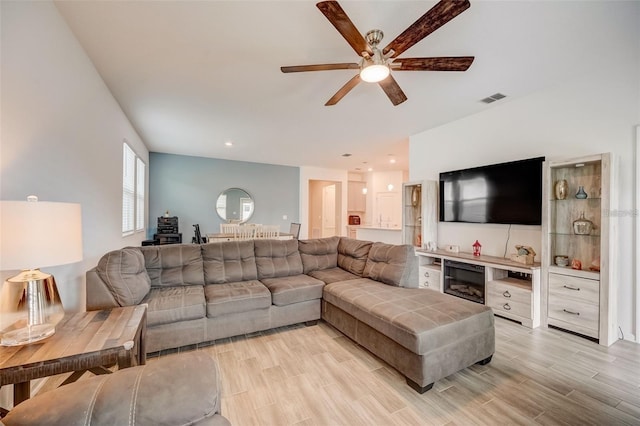 living room with ceiling fan